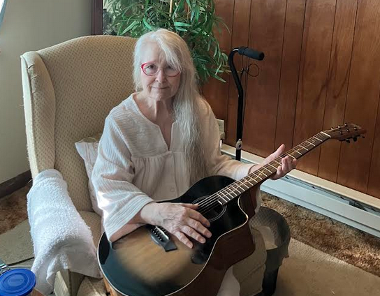 Linda receives a free guitar